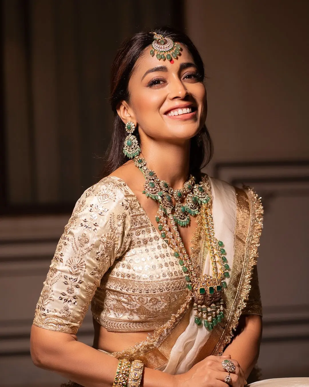 Shriya Saran Wearing Beautiful Earrings Jewellery White Saree